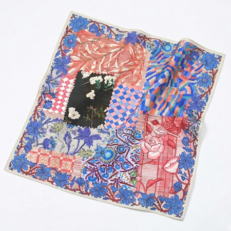 Colourful illustrated textile scarf with floral and decorative motifs